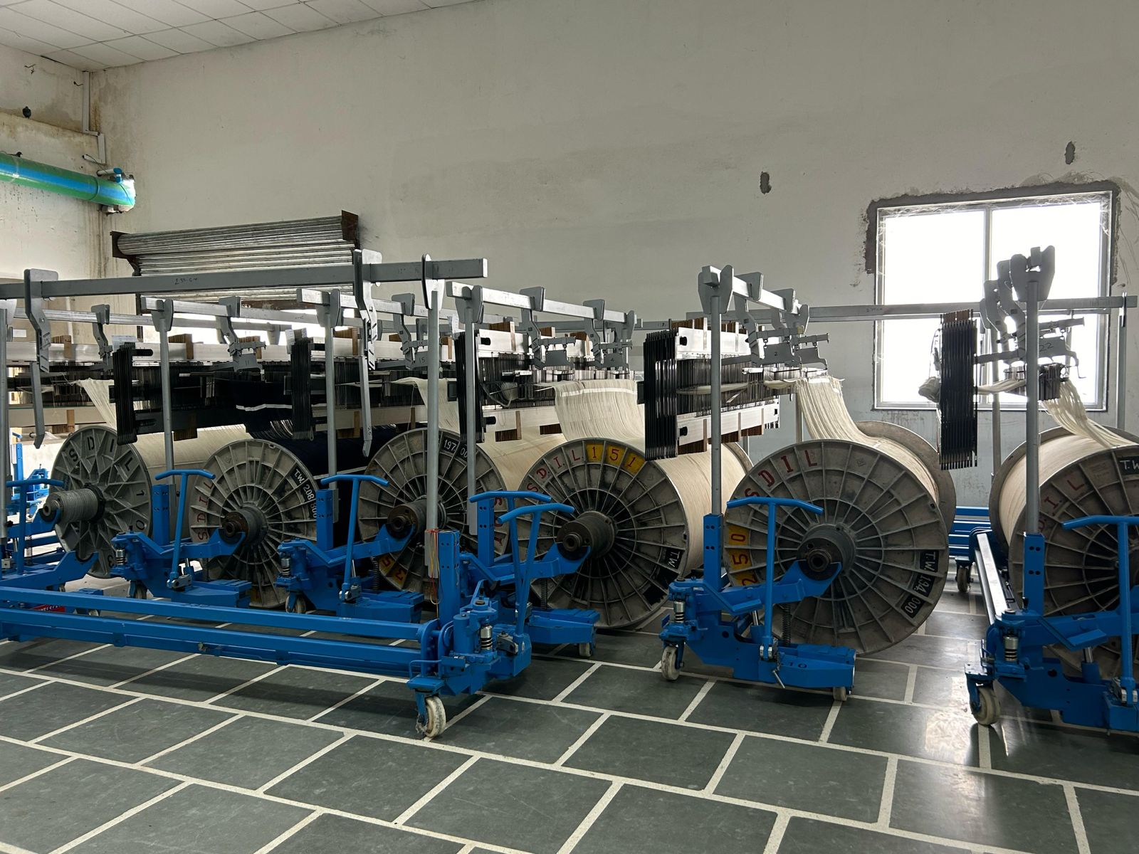 Staubli SAFIR automated drawing-in machine